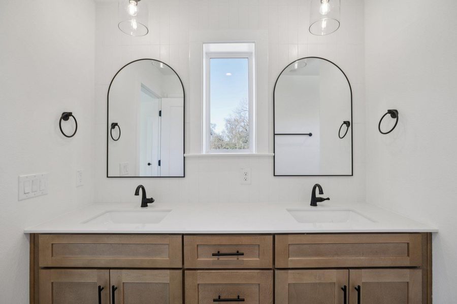 Full bathroom featuring double vanity