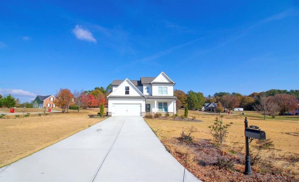 Front exterior of a new home in , Commerce, GA, highlighting curb appeal (Image 29). Front exterior of a new home in , Commerce, GA, highlighting curb appeal (Image 29).