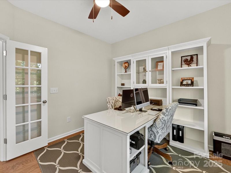 Dining Room enhanced with Crown, Chair Rail and Picture Frame Moldings, plus Wood Floors