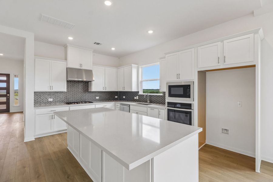 Furnished interior view inside a new home in Silverleaf, Cedar Creek (Image 6).
