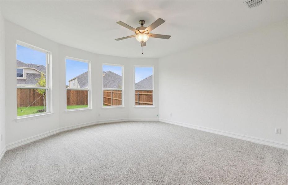 Elegant owner's suite with Bay window*real home pictured