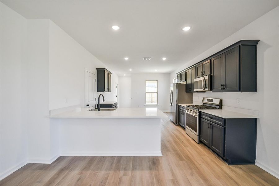 Furnished interior view inside a new home in Mostyn Springs, Magnolia (Image 7).