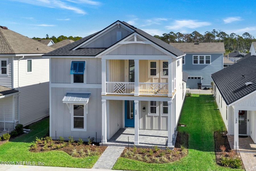 Front exterior of a new home in , Ponte Vedra, FL, highlighting curb appeal (Image 26).