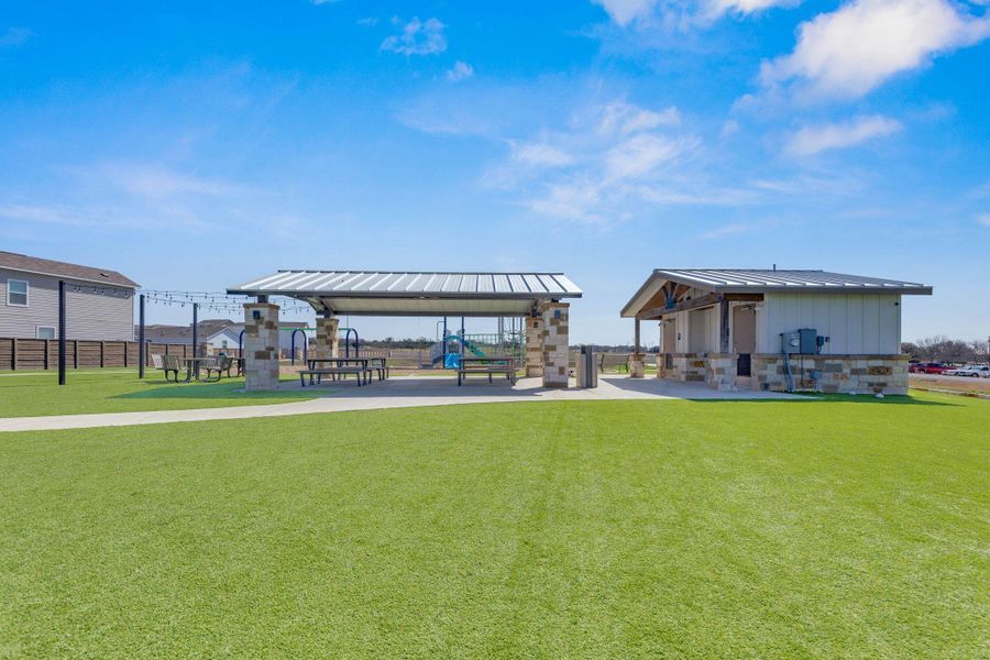 Community hangout, playground picnic tables, and restrooms.