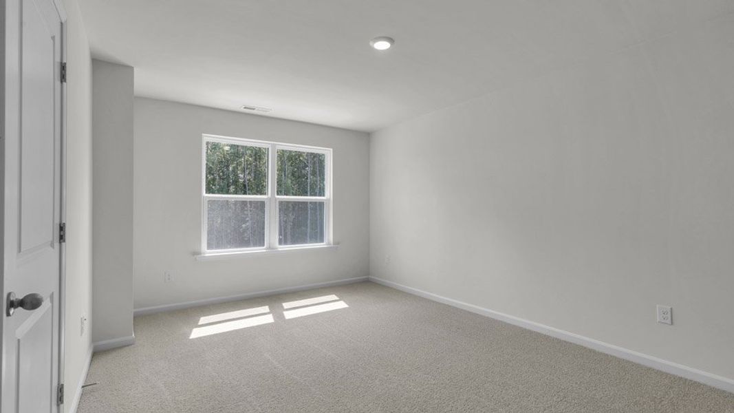 Spacious, unfurnished interior of a new home in The Townes at Bexford, Willow Spring (Image 16). Spacious, unfurnished interior of a new home in The Townes at Bexford, Willow Spring (Image 16).