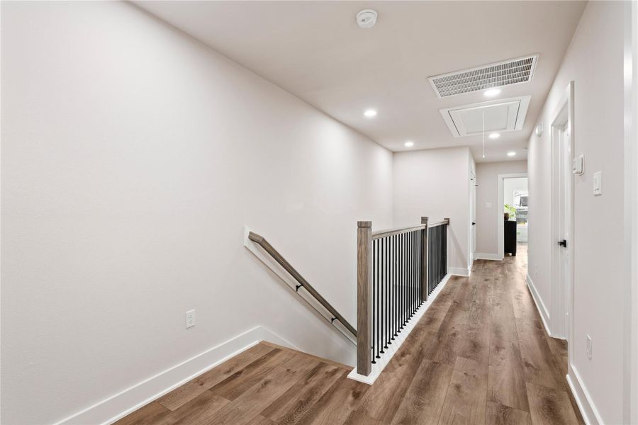 Upstairs feels bright and airy with clean lines, modern finishes, and a layout that offers both privacy and functionality. The open landing provides a natural transition between rooms while keeping the home feeling light and spacious.