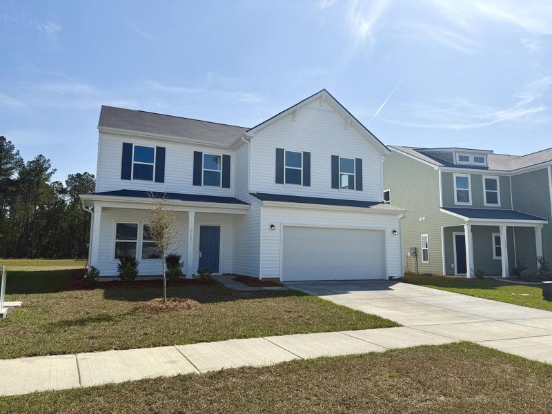 Front exterior of a new home in , Summerville, SC, highlighting curb appeal (Image 15).