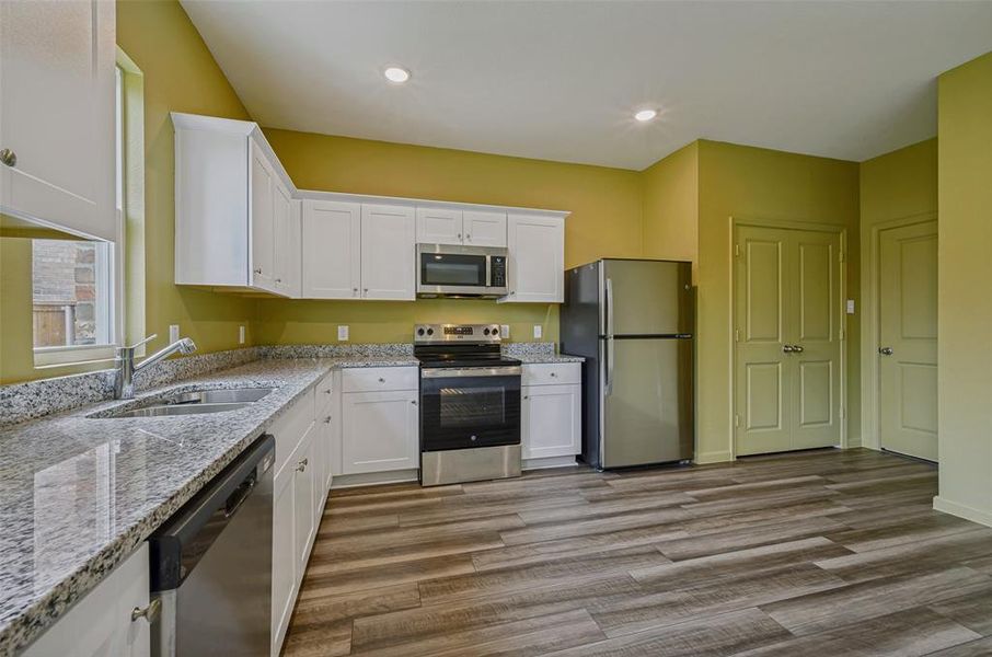 Furnished interior view inside a new home in Creekview Fossil Ridge, Pilot Point (Image 9).