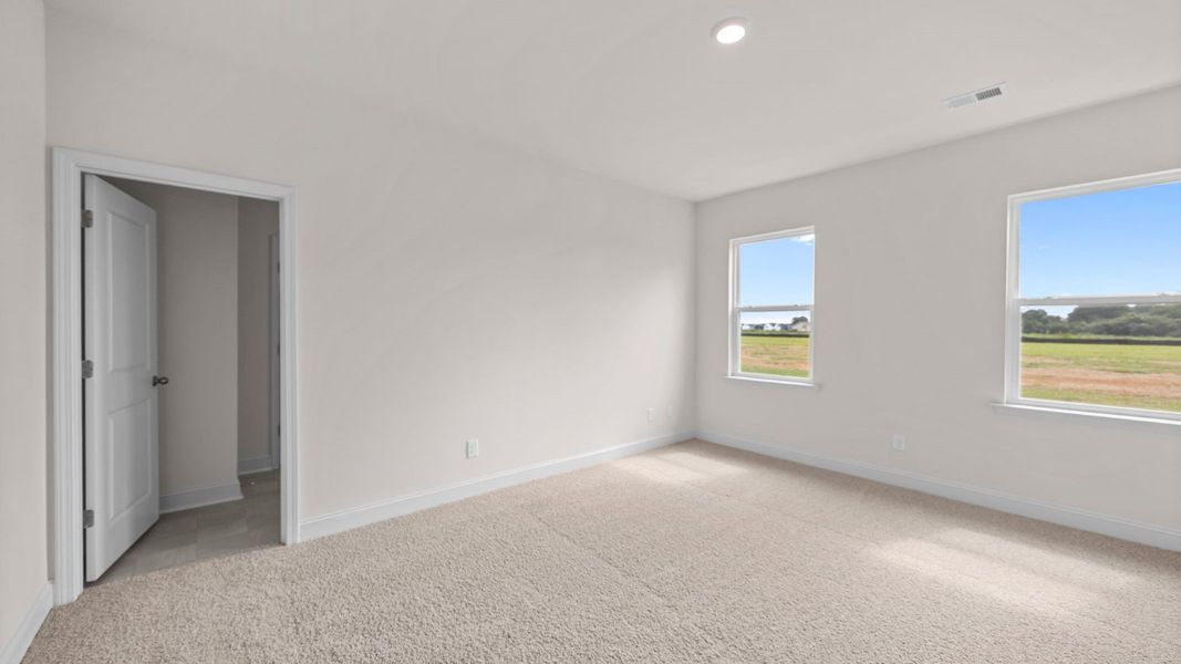 Representative unfurnished interior of a home built from the Booth by D.R. Horton in Villa Grande, Winterville (Image 31). Representative unfurnished interior of a home built from the Booth by D.R. Horton in Villa Grande, Winterville (Image 31).