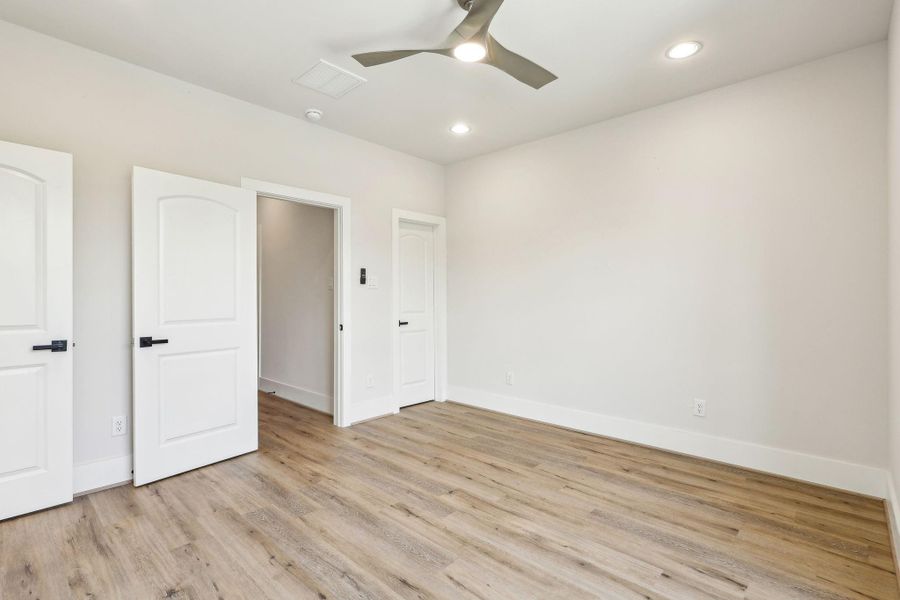 Third bedroom with ceiling fan