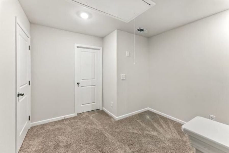 Representative unfurnished interior of a home built from the Brentwood by Piedmont Residential in Falls Creek, Flowery Branch (Image 25).