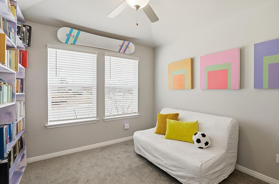 At the front of the home, a private guest suite with its own ensuite bath is ideal for multigenerational living, hosting visitors, or giving a teen their own haven.