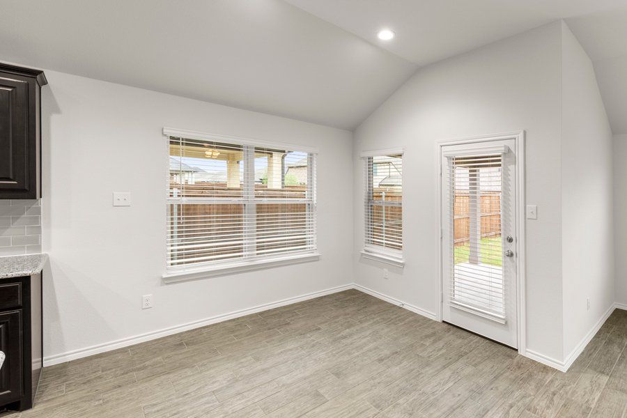 Representative exterior photo of a completed home built from the Cheyenne by Impression Homes in DeBerry Reserve, Royse City, TX (Image 8).