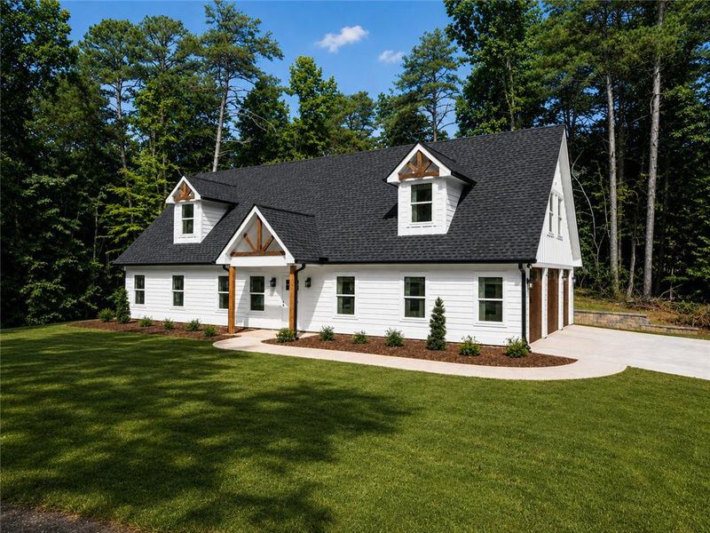 Front exterior of a new home in , Gainesville, GA, highlighting curb appeal (Image 2). Front exterior of a new home in , Gainesville, GA, highlighting curb appeal (Image 2).