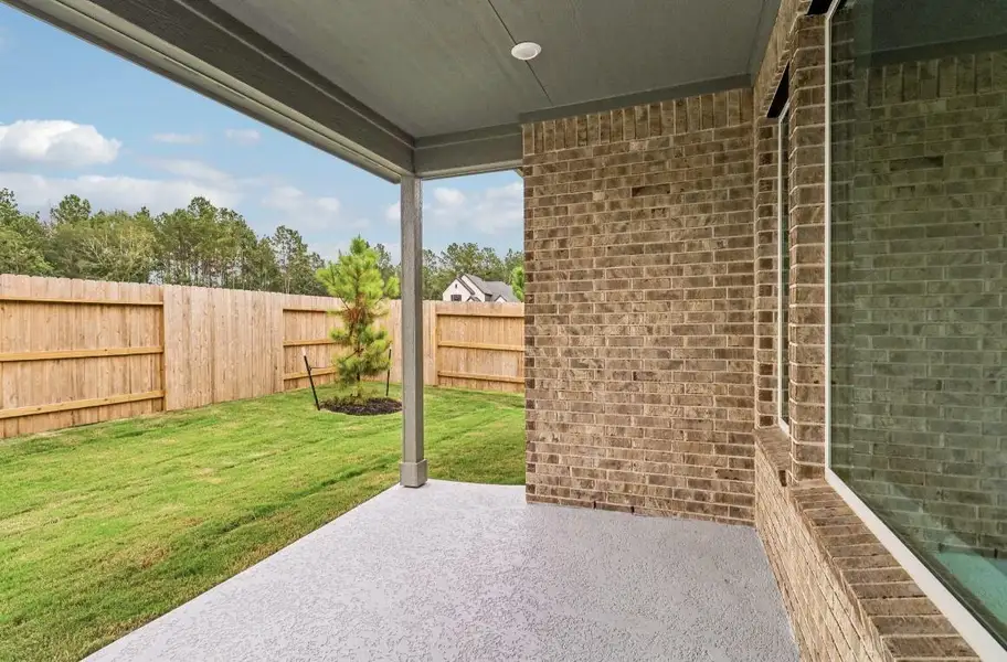 Exterior details and patio area of a home in WILDTREE 50', Montgomery (Image 4). Exterior details and patio area of a home in WILDTREE 50', Montgomery (Image 4).