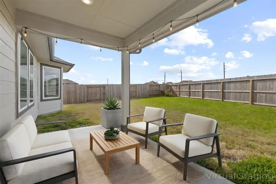 Exterior details and patio area of a home in Wall Street Village, Richmond (Image 4).