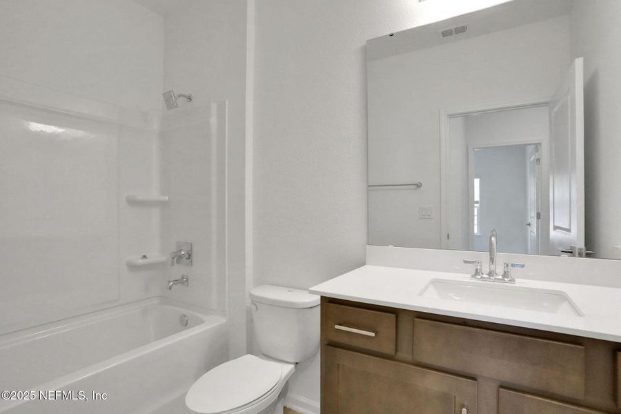 Furnished interior view inside a new home in Silver Landing at SilverLeaf, St. Augustine (Image 7).