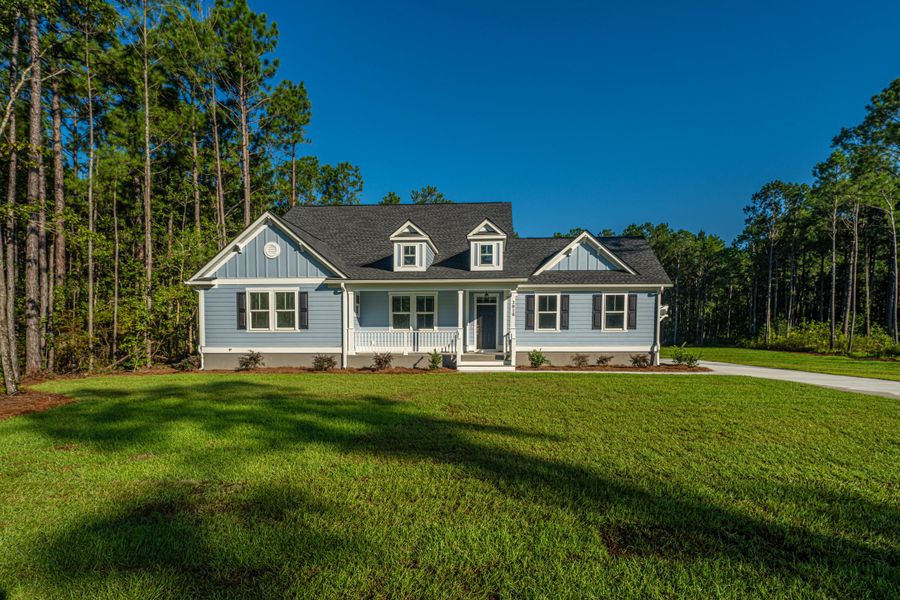 Front exterior of a new home in , Awendaw, SC, highlighting curb appeal (Image 14).