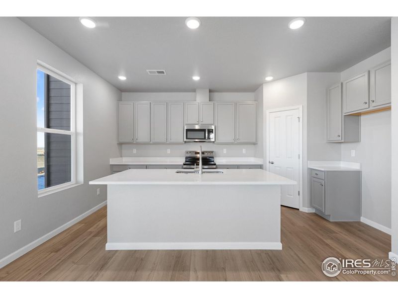 Furnished interior view inside a new home in Cordovan, Longmont (Image 7).