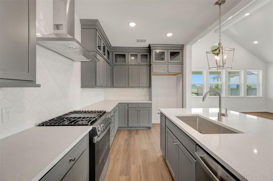 Stunning kitchen with grey stacked cabinets