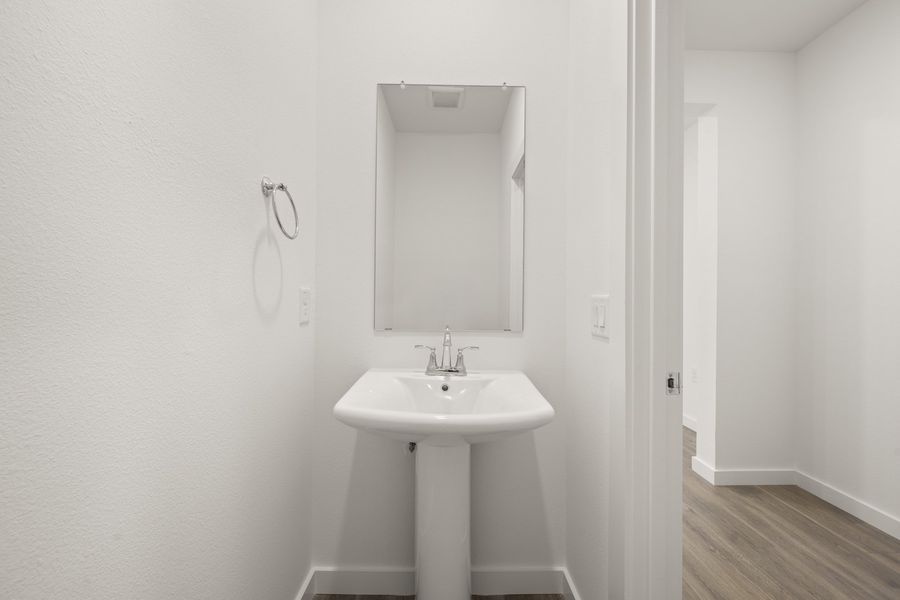 Furnished interior view inside a new home in Wildridge, Oak Point (Image 9).