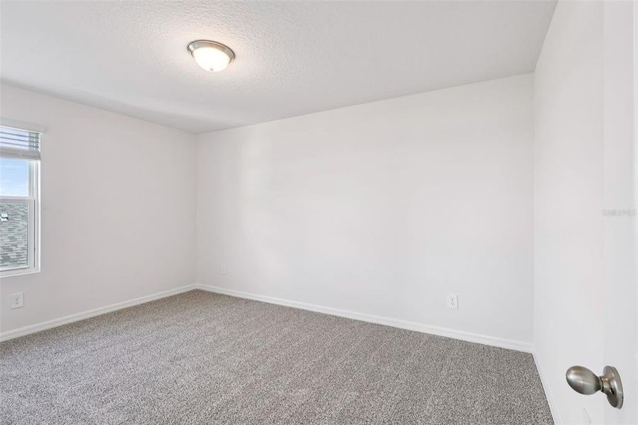 Spacious, unfurnished interior of a new home in Crosswinds - Signature Series, Haines City (Image 28).