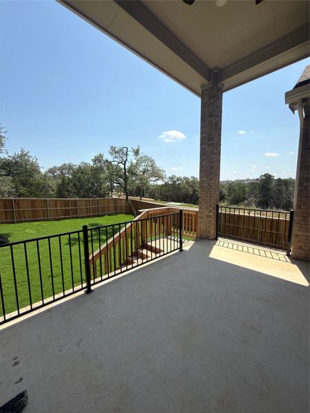 Rear Covered Patio and private backyard