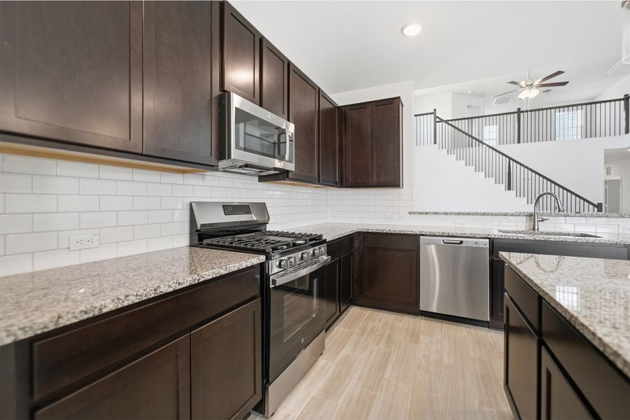 Furnished interior view inside a new home in Briarwood, Elgin (Image 10).