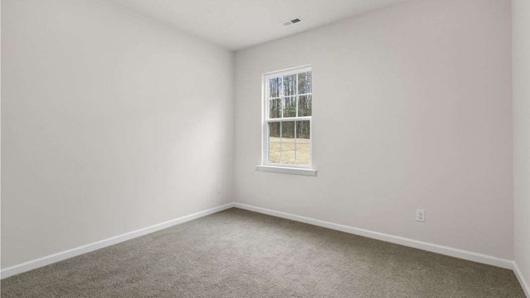 Spacious, unfurnished interior of a new home in The Reserve at Stoney Creek, Whitsett (Image 14).