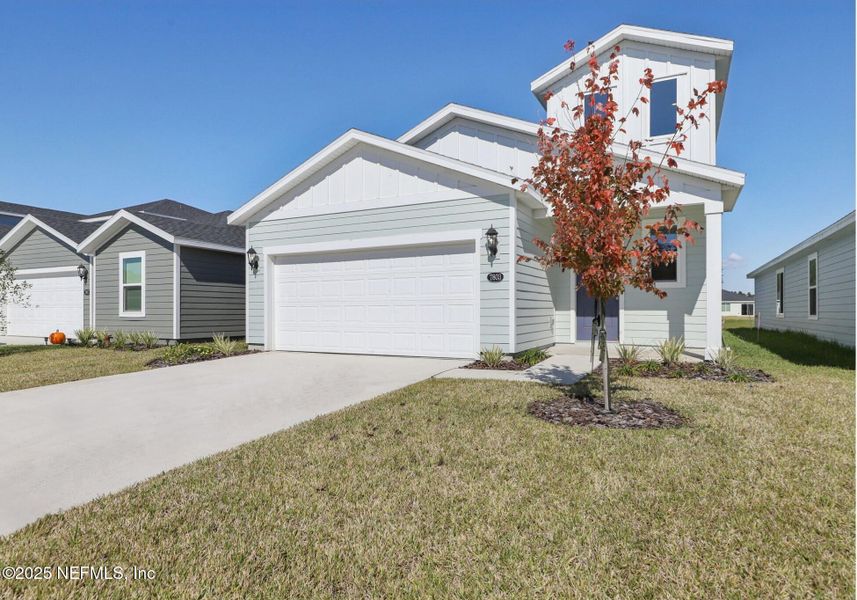 Front exterior of a new home in Kings Preserve, Jacksonville, FL, highlighting curb appeal (Image 2).