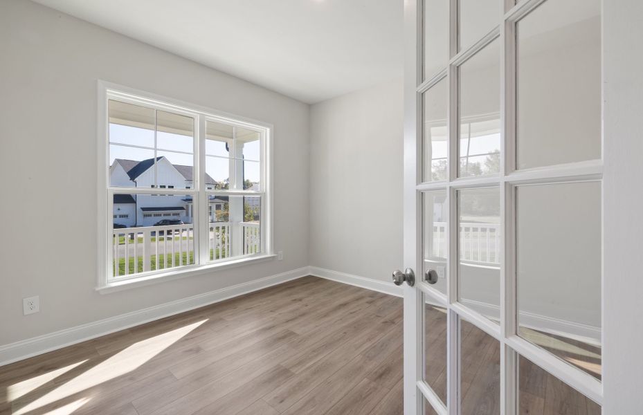 Spacious, unfurnished interior of a new home in Browning Stables, Wendell (Image 22).