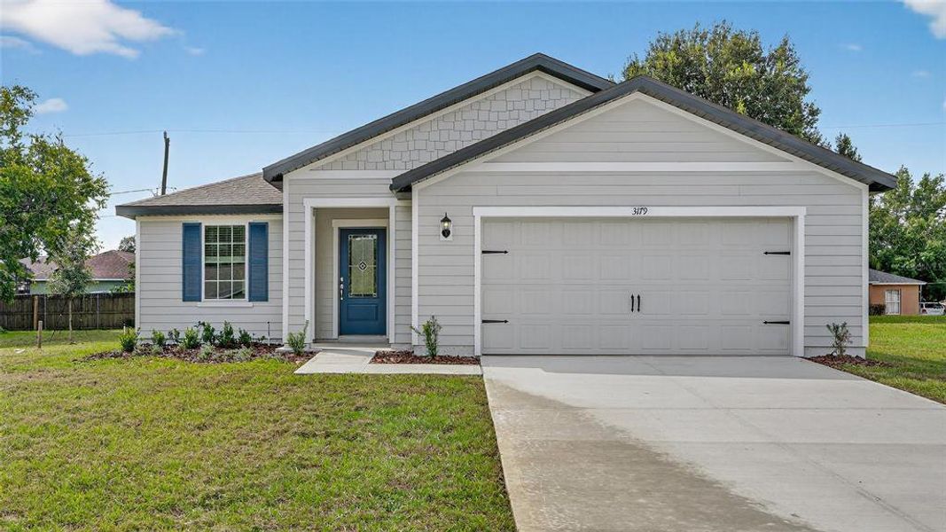 Front exterior of a new home in , Deltona, FL, highlighting curb appeal (Image 1). Front exterior of a new home in , Deltona, FL, highlighting curb appeal (Image 1).