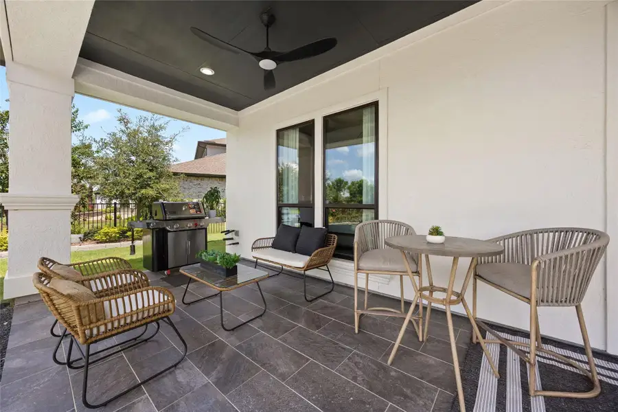 Exterior details and patio area of a home in Bridgeland, Cypress (Image 4).