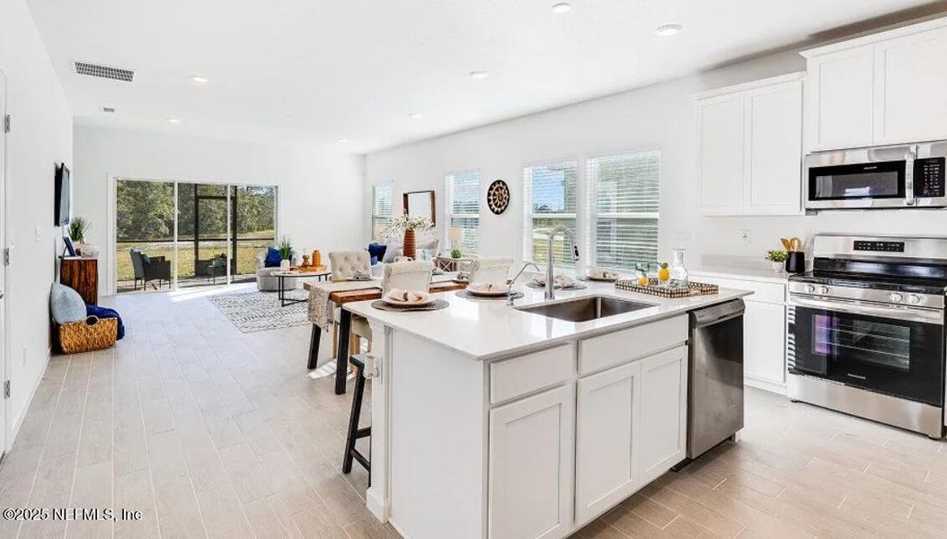 Furnished interior view inside a new home in Edenbrooke at Hyland Trail | 55+: Edenbrooke at Hyland Trail 50s, Green Cove Springs (Image 11).