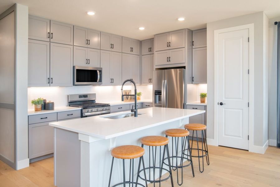 Furnished interior view inside a new home in Windsong, Thornton (Image 5).