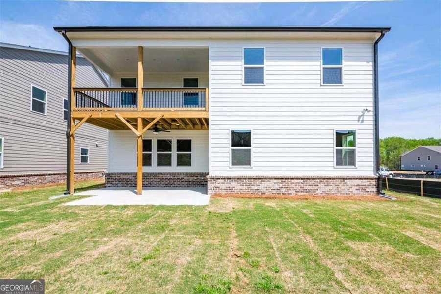 Exterior details and patio area of a home in The Paddocks at Doc Hughes, Buford (Image 23).