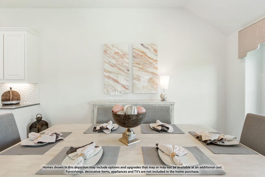 Dining room with set table for six, decorative bowl centerpiece, and abstract wall art panels Dining room with set table for six, decorative bowl centerpiece, and abstract wall art panels