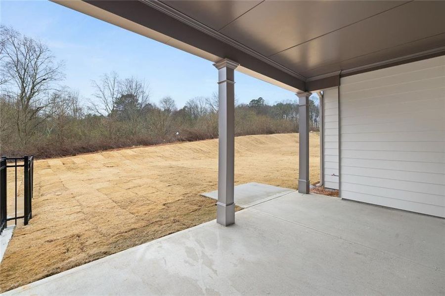 Exterior details and patio area of a home in Soleil Belmont Park, Canton (Image 32).