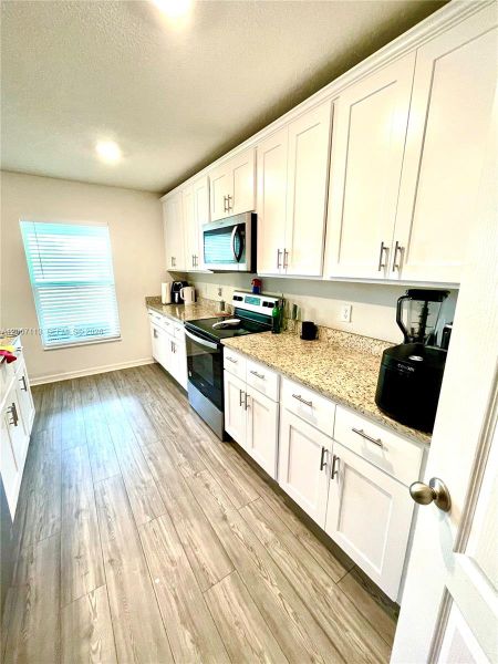 Furnished interior view inside a new home in , Port St. Lucie (Image 6). Furnished interior view inside a new home in , Port St. Lucie (Image 6).