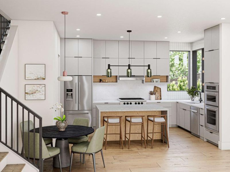 Modern kitchen featuring light wood-finish flooring, white flat-panel cabinetry, a stainless steel appliance package, and a kitchen island with seating