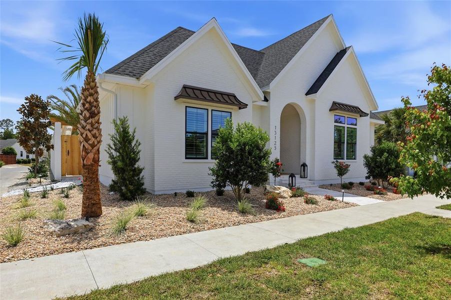 Front exterior of a new home in , Newberry, FL, highlighting curb appeal (Image 22).