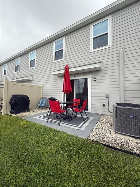 Exterior details and patio area of a home in The Towns at Laurel Commons, Ocala (Image 28).