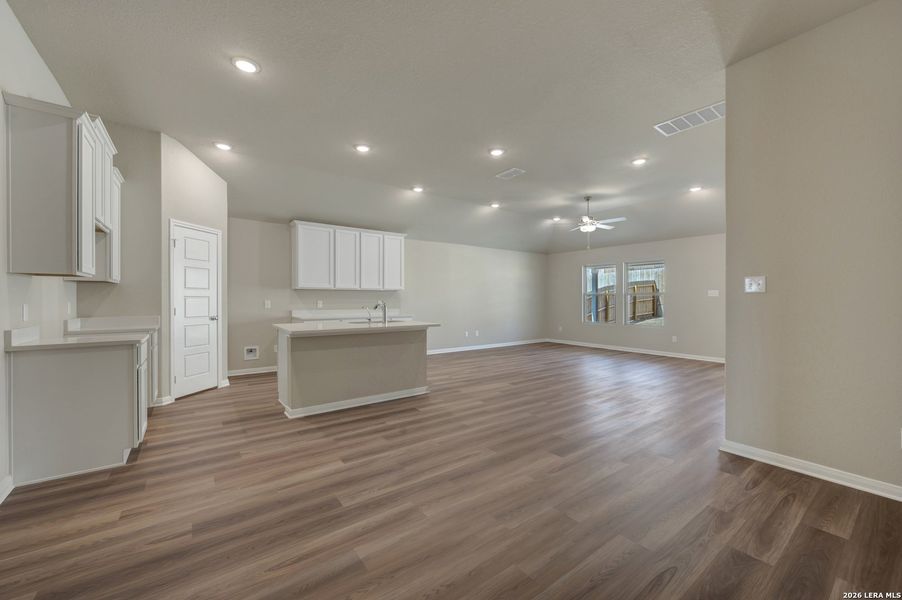 Spacious, unfurnished interior of a new home in Hunters Ranch, San Antonio (Image 42).