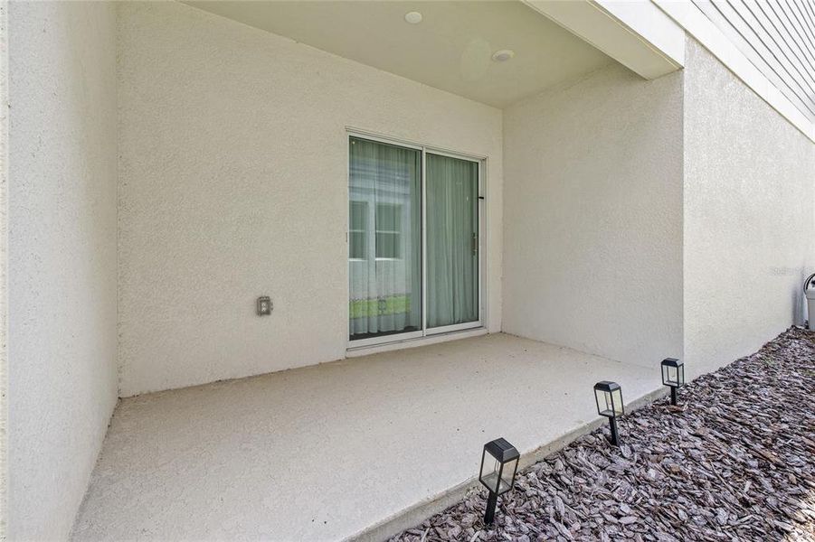 Exterior details and patio area of a home in Wellness Ridge, Clermont (Image 29).
