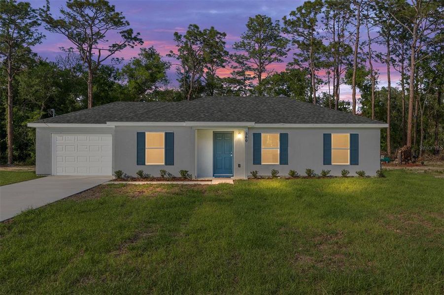 Front exterior of a new home in , Ocala, FL, highlighting curb appeal (Image 2).