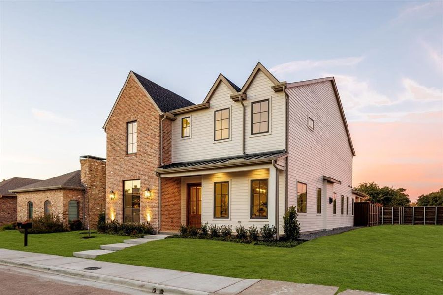 Front exterior of a new home in , Dallas, TX, highlighting curb appeal (Image 24). Front exterior of a new home in , Dallas, TX, highlighting curb appeal (Image 24).