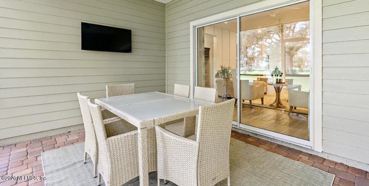 Exterior details and patio area of a home in Silver Falls Single Family at SilverLeaf, St. Augustine (Image 2).