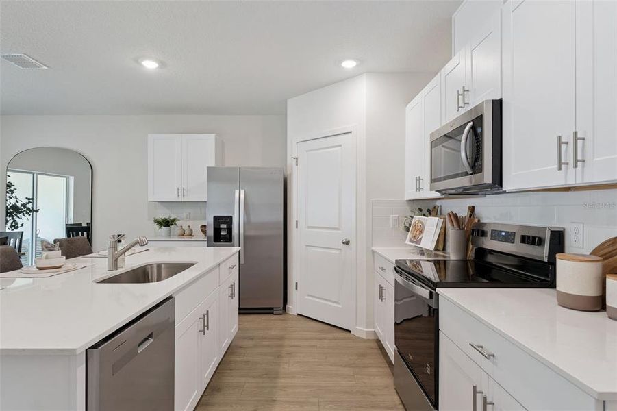 Furnished interior view inside a new home in Crossroads at Kelly Park, Apopka (Image 13).