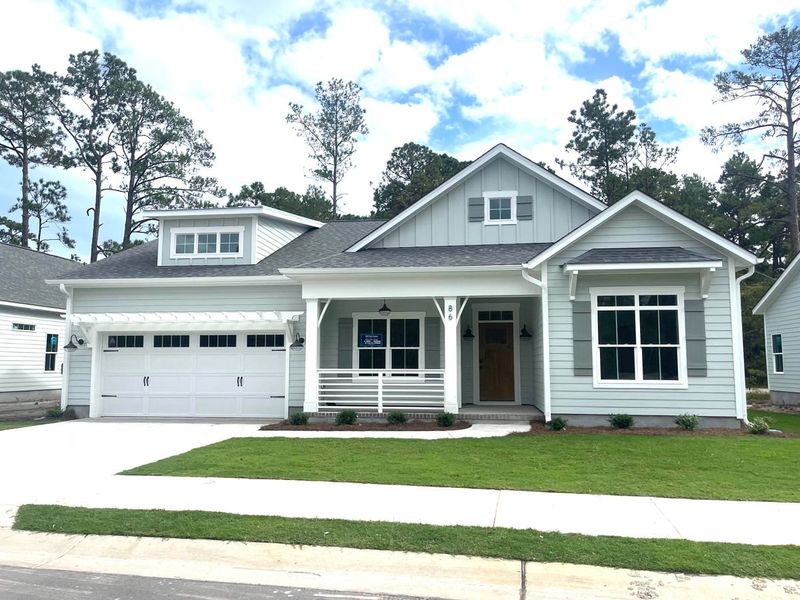 Representative exterior photo of a completed home built from the Lanai by Bill Clark Homes in Sidbury Landing, Wilmington, NC (Image 32). Representative exterior photo of a completed home built from the Lanai by Bill Clark Homes in Sidbury Landing, Wilmington, NC (Image 32).