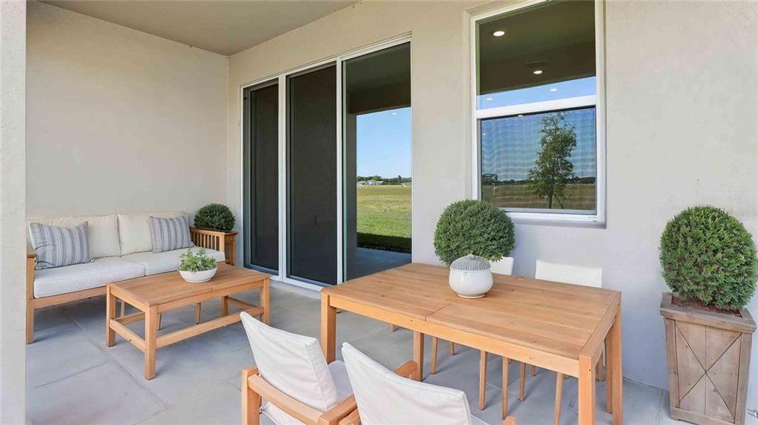 Exterior details and patio area of a home in Twisted Oaks, Wildwood (Image 2). Exterior details and patio area of a home in Twisted Oaks, Wildwood (Image 2).